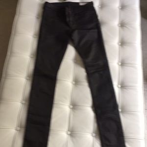 All Saints waxed Black skinny jeans.